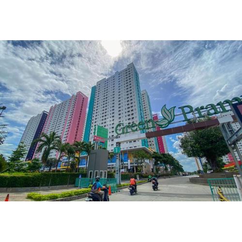 Cozy Living 2BR Green Pramuka City Apartment near Mall By Travelio