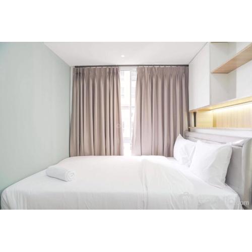 Cozy Living and Homey 2BR Tokyo Riverside PIK 2 Apartment By Travelio