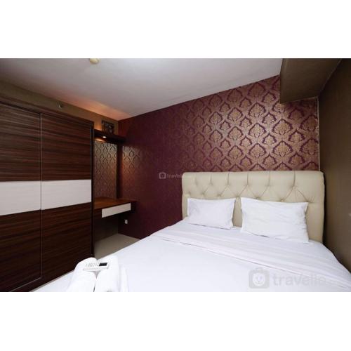 Cozy Living and Modern 2BR Bassura City Apartment By Travelio