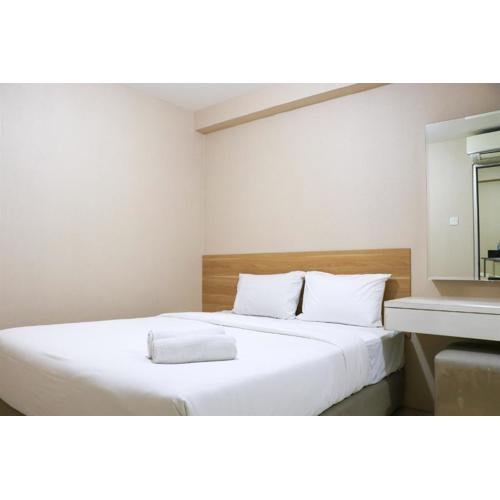 Cozy Living and Tidy 2BR Green Bay Pluit Apartment By Travelio