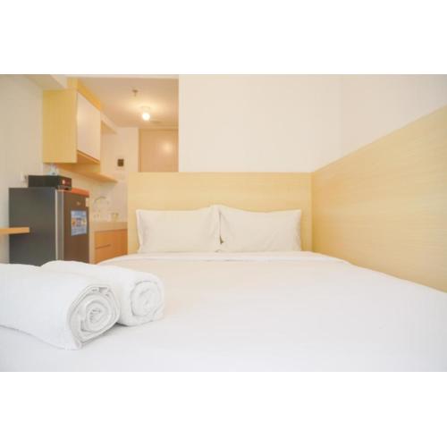 Cozy Living and Warm Studio at Tokyo Riverside PIK 2 Apartment By Travelio