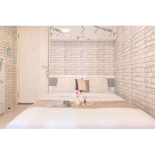 Cozy Living Studio above Mall with Pool View at Bassura city Apartment By Travelio