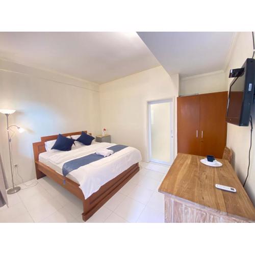 Cozy room Kuta - 1 minutes to the beach by Micky Studio