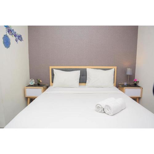 Cozy Stay 1BR at Grand Kamala Lagoon Apartment By Travelio