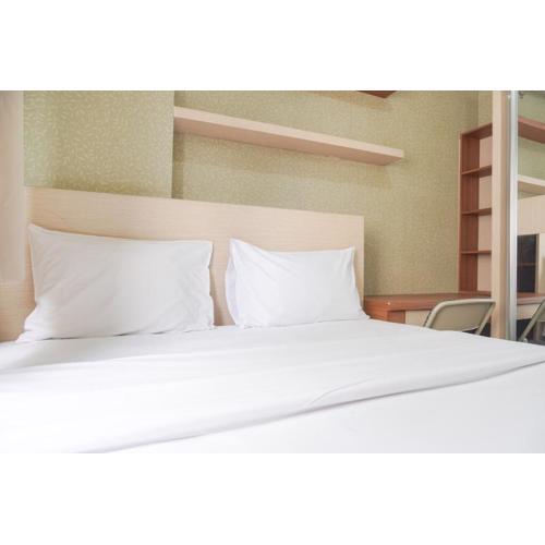 Cozy Stay 1BR at Green Pramuka City Apartment By Travelio