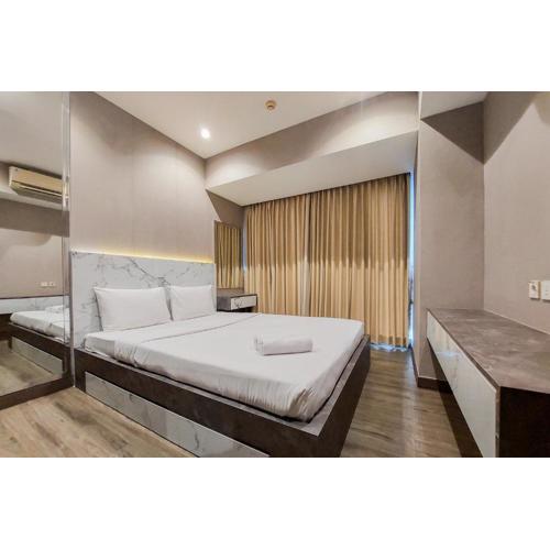 Cozy Stay 2BR Branz BSD City Apartment near AEON Mall By Travelio