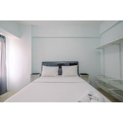 Cozy Stay 2BR Tamansari Mahogany Apartment By Travelio