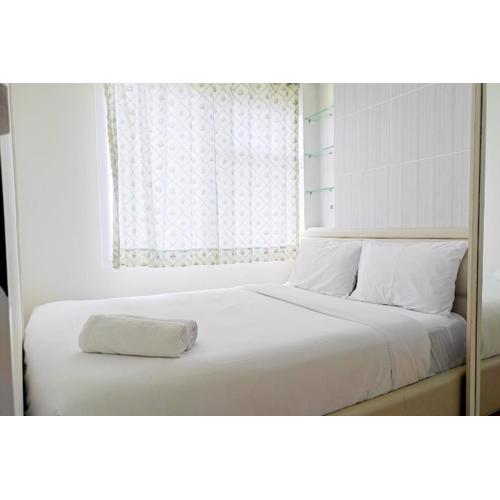 Cozy Stay and Homey 2BR Vida View Apartment By Travelio