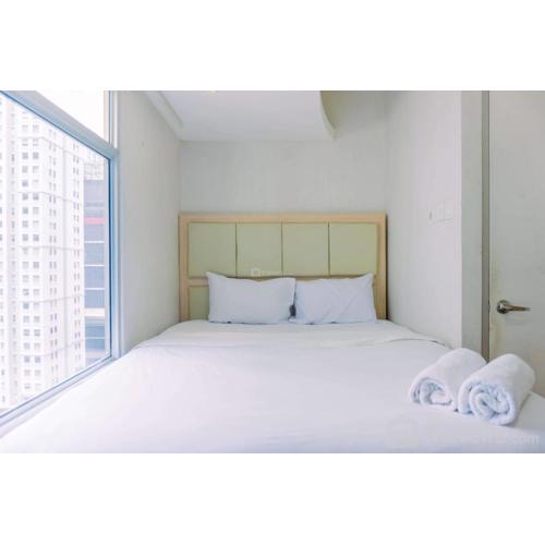 Cozy Stay and Tidy 1BR Green Bay Pluit Apartment By Travelio