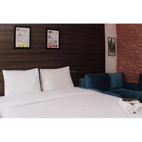 Cozy Stay and Tranquil Studio Patraland Urbano Apartment By Travelio