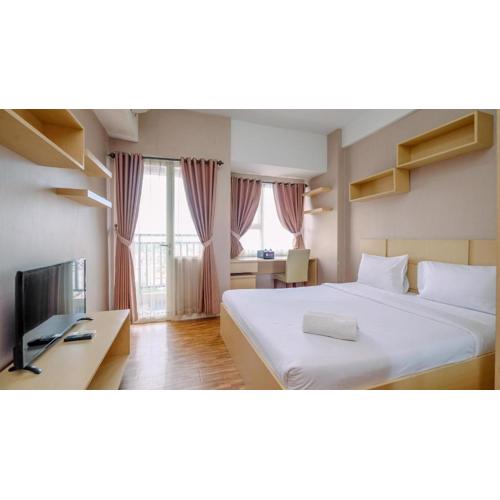 Cozy Stay and Warm Studio Apartment at Margonda Residence 5 By Travelio