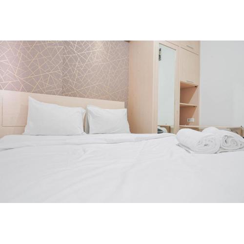 Cozy Stay at 2BR Green Pramuka City Apartment near Shopping Center By Travelio