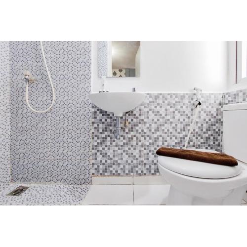 Cozy Stay Studio Apartment at Aeropolis Residence By Travelio