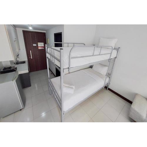 Cozy Stay Studio Apartment at Scientia Residence By Travelio