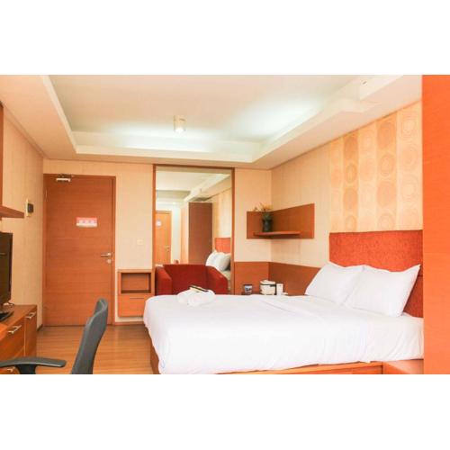 Cozy Stay Studio Apartment (No Kitchen) at Metropark Condominium Jababeka By Travelio