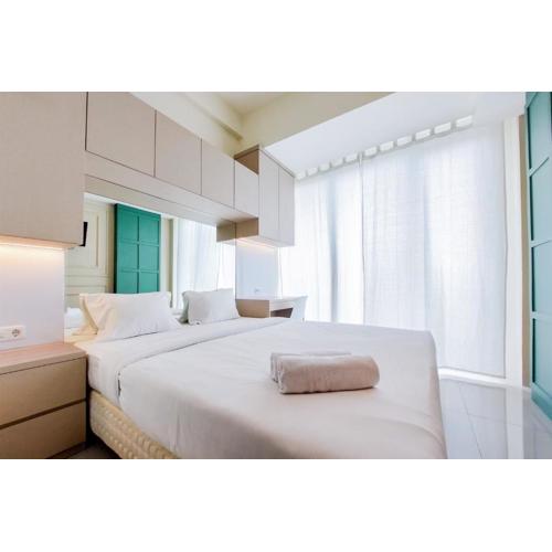 Cozy Stay Studio at Tree Park City BSD Apartment By Travelio