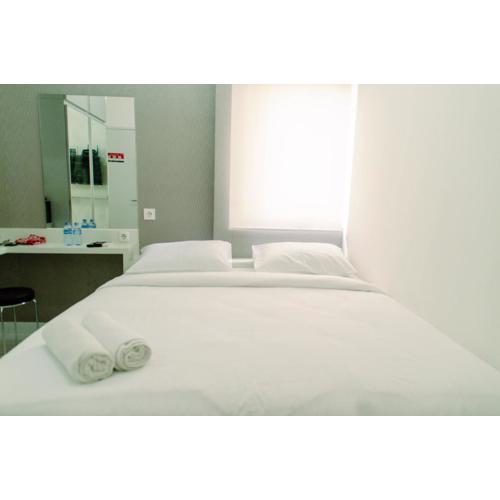 Cozy Studio Apartment at Aeropolis Residence No Kitchen near CGK Airport By Travelio