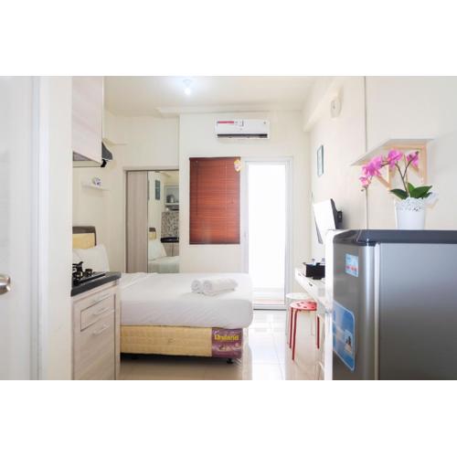 Cozy Studio Apartment Connected to Mall at Green Pramuka City By Travelio