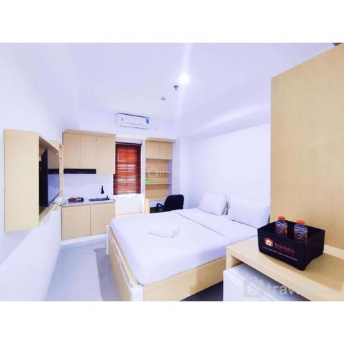 Cozy Studio at 9th Floor Paltrow City Apartment By Travelio