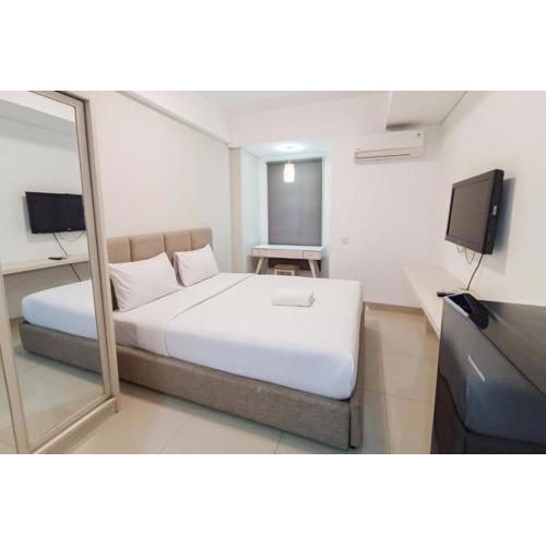 Cozy Studio at Barsa City Apartment By Travelio