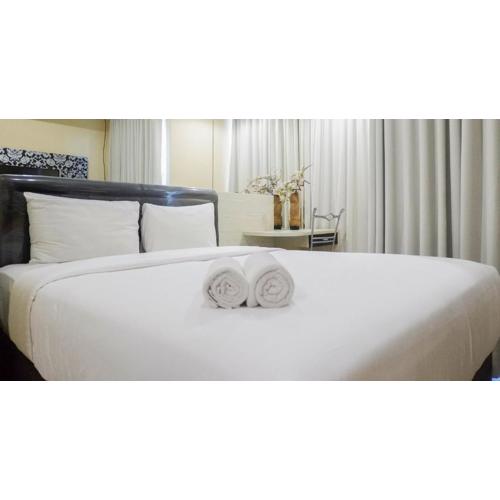 Cozy Studio at Tamansari Papilio Apartment By Travelio