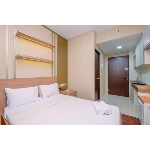 Cozy Studio at Transpark Cibubur Apartment By Travelio