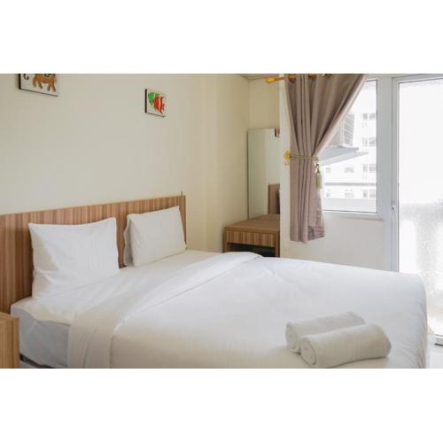 Cozy Studio Green Pramuka Apartment next to Mall By Travelio