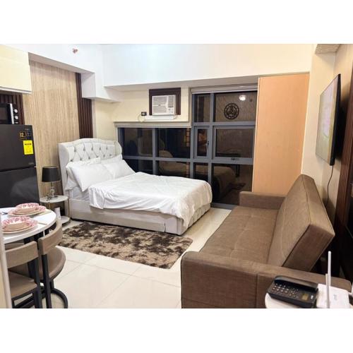Cozy Studio near BGC Super Fast Wi-Fi