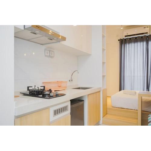 Cozy Studio Room at Sky House BSD Apartment By Travelio