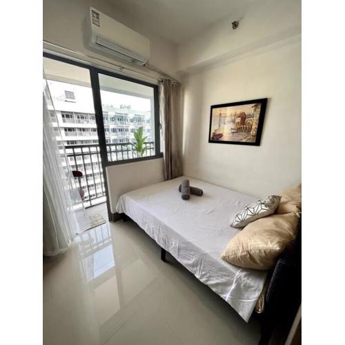 cozy studio unit at fame residence metro manila
