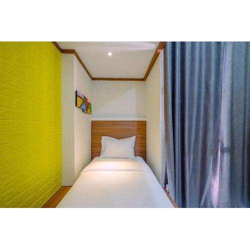 Cozy Studio with Bunk Bed at Dave Apartment near UI By Travelio