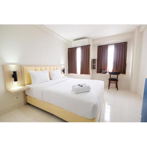 Cozy Studio with City View at Elvis Tower Apartment By Travelio