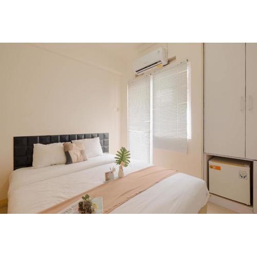 Cozy Studio with Direct Access to Mall at Green Pramuka Apartment By Travelio