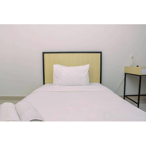 Cozy Studio with Single Bed at Evenciio Margonda Apartment By Travelio