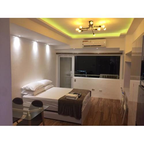 Cozy35sqm w parking balcony Wifi/Netflix near Mall