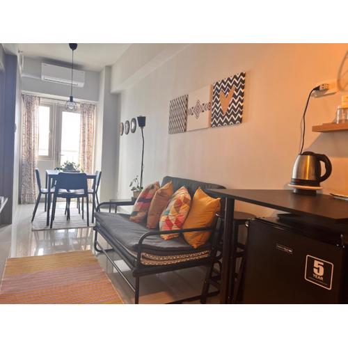 CozyCoastStay by APPLETRAVELBEYONDPH