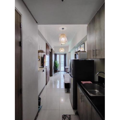 CozyStay by MA Condotel-Coast Residences