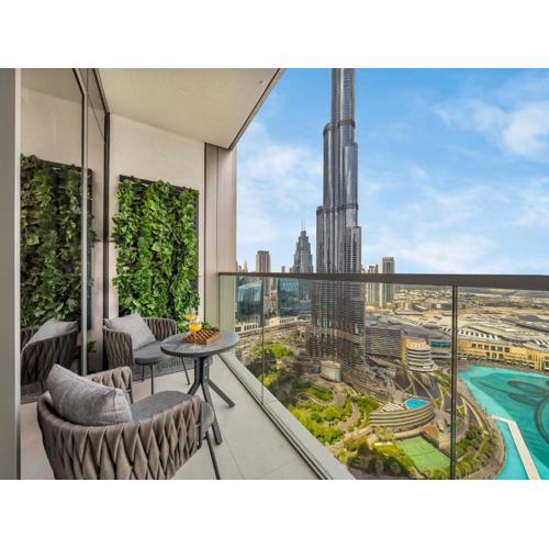 Crown Jewel 2 Bedroom Apartments I Iconic Burj Khalifa and Fountain Views I Free Parking, Gym, Pool, Wi-Fi and PS5 I by Skyline Serenity