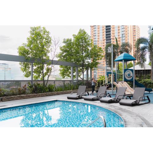 Cubao Manhattan Heights Residential Condo TA4N - Low Floor Studio with Pool & Balcony, 5 Mins Walk to Gateway Mall & Araneta Coliseum LRT MRT Cubao Quezon City - Staycations by SMS