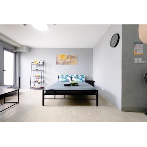 Cubao Manhattan Plaza Residential Condo T139G - HUGE Studio with Pool, Kitchen & Balcony, Walk Distance to Araneta Coliseum LRT MRT Malls in Cubao Quezon City - Staycations by SMS