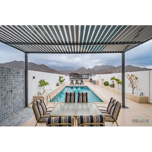 Deal of the Week 4BR with Pool, Sea & Mountain Views by Deluxe Holiday Homes