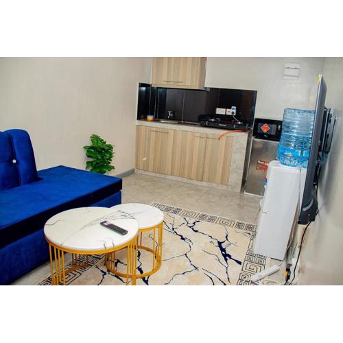 DefiniteHomes3 - Fully furnished studio apartment with a rooftop restaurant near JKIA Airport, SGR Terminus, Downtown