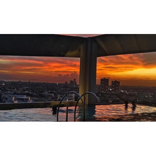 Deluxe One Bedroom Suite by Christine Suites infront of Trinoma Mall