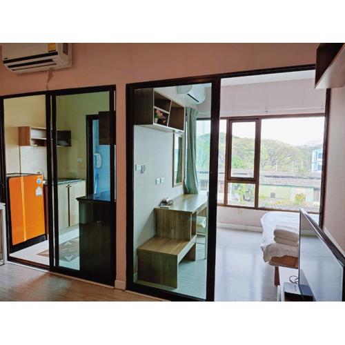 Deluxe Room at Tree Boutique Condo by Suwan Style Agency