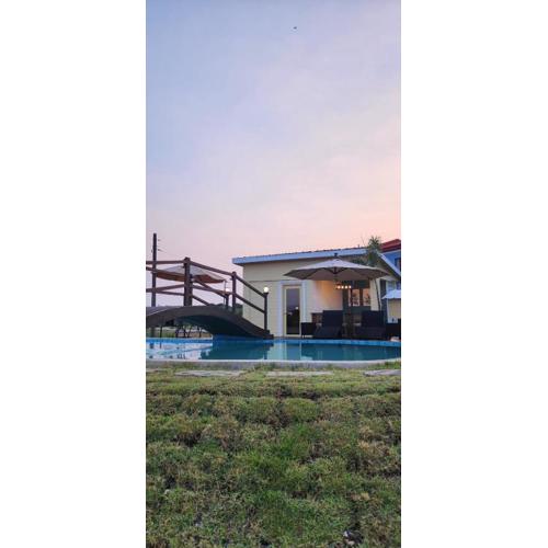 DELUXE ROOM BY THE POOL