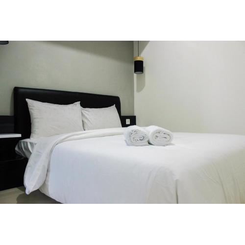 Direct Access to Pool 2BR Apartment at Parahyangan Residence By Travelio