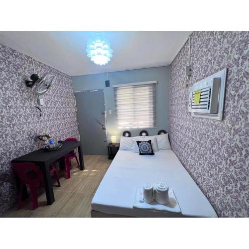 DJCI Apartelle Walk to Robinson & NE Pacific Mall 3 Min to SM Cabanatuan