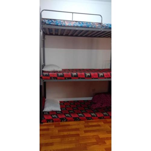 Dormitory bed space in a shared room