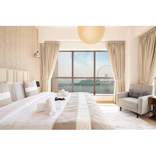 Dubai Eye & Sea View, 1-min walk to JBR Beach, Luxurious Beach Retreat!