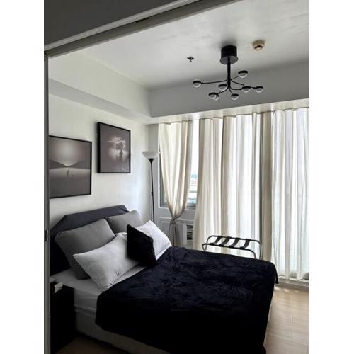 El Spacio Azure 1BR with PS4 & Netflix